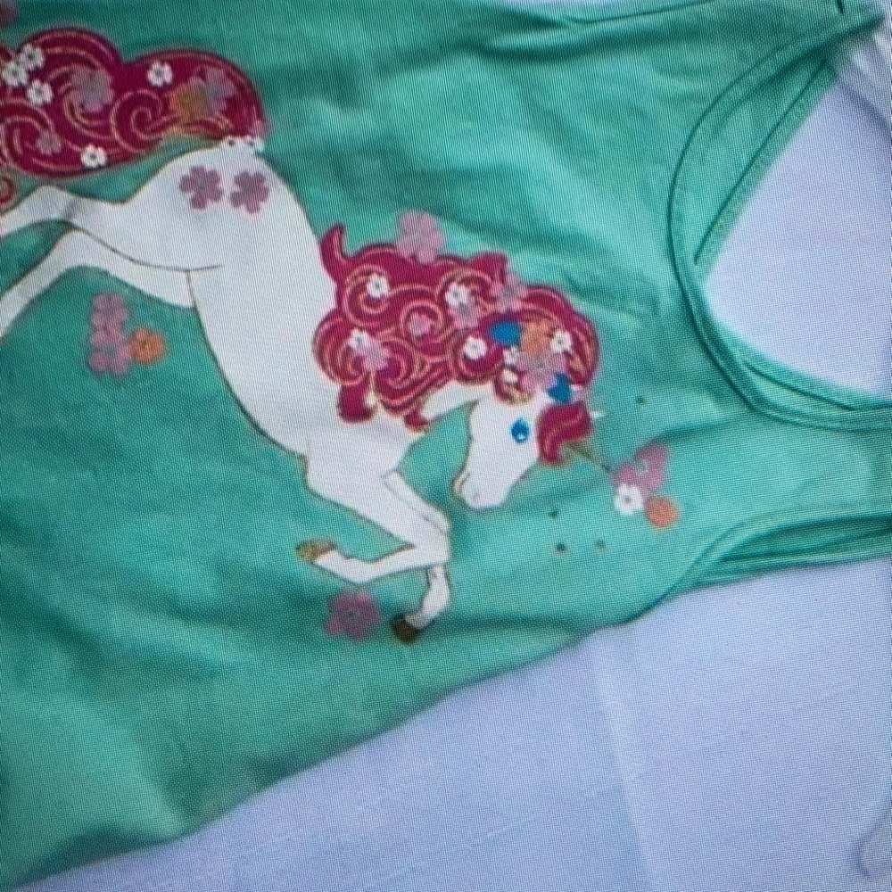 Cute top with unicorn on the front